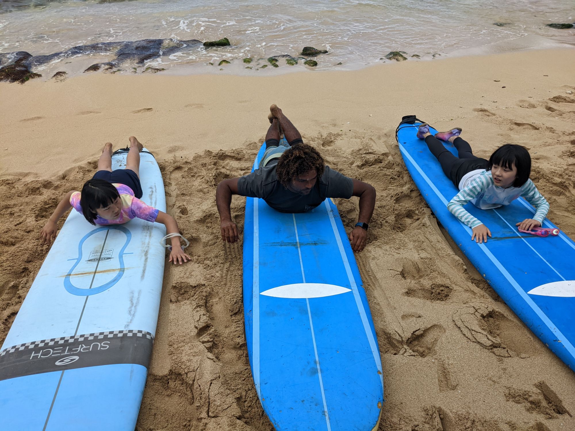 Surf lesson at Haleiwa North Shore North Shore Shuttle post thumbnail image